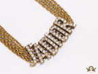 Golden multi chain choker necklace with alphabet motif in cz