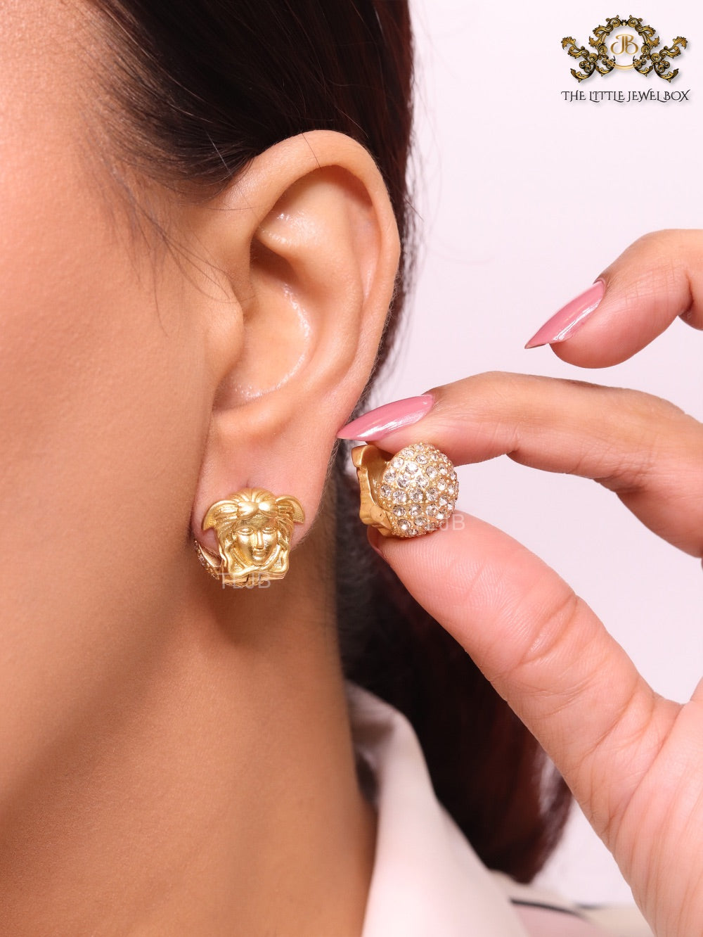 Reversible gold medusa studs with cz