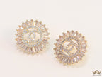 Round gold studs lined with cz baguettes and twin C cz motif centre