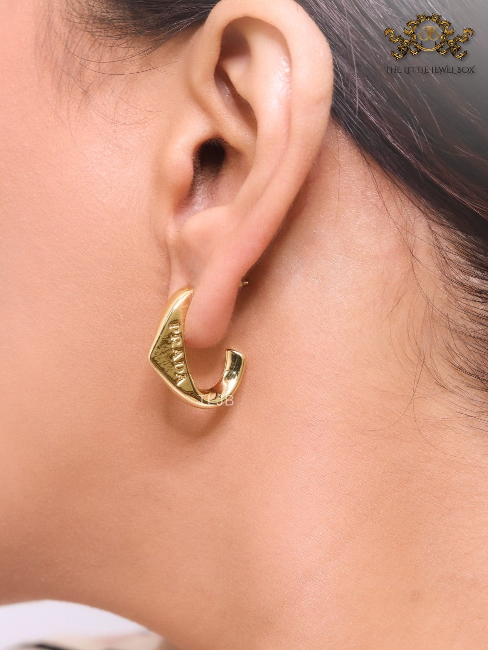 Gold open designer hoops