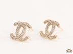 Gold plated twin C motif studs with cz