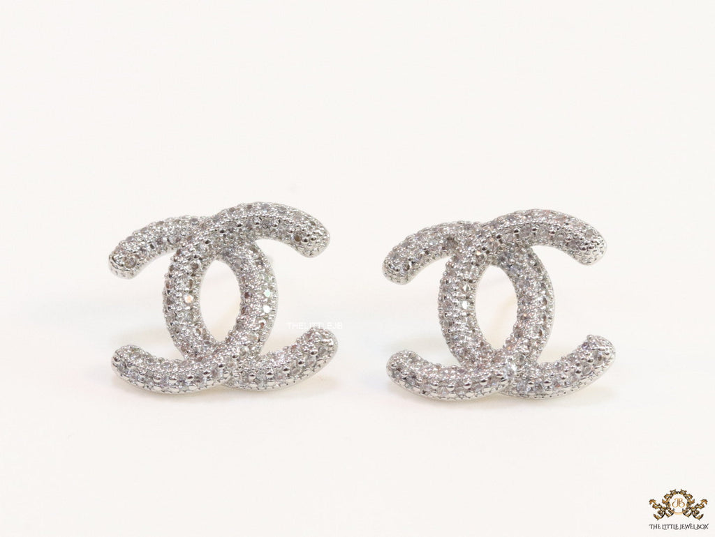 Platinum plated twin C motif studs with cz