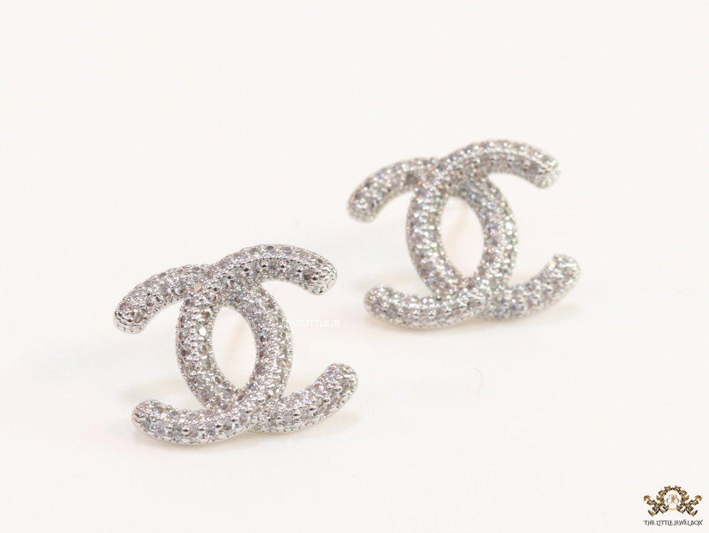 Platinum plated twin C motif studs with cz