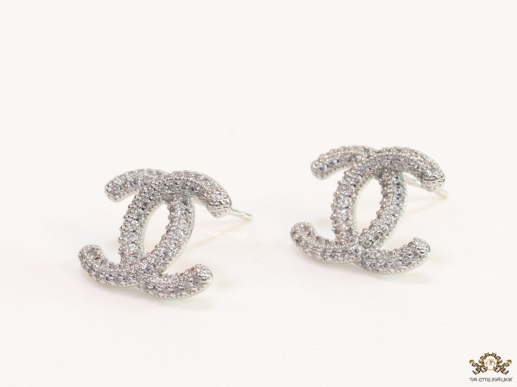 Platinum plated twin C motif studs with cz