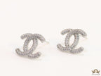 Platinum plated twin C motif studs with cz