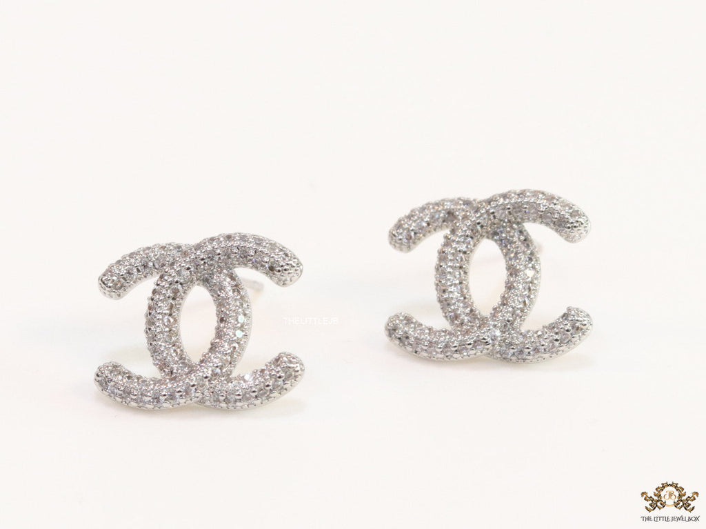 Platinum plated twin C motif studs with cz