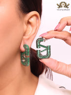Alphabet V green Stone studded hoops
