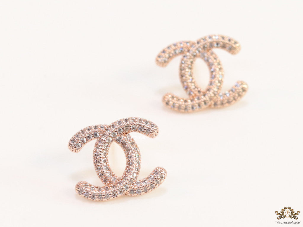 Rose gold plated twin C motif studs with cz