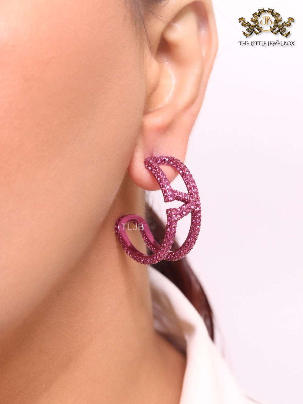 Pink curved open alphabet V hoops