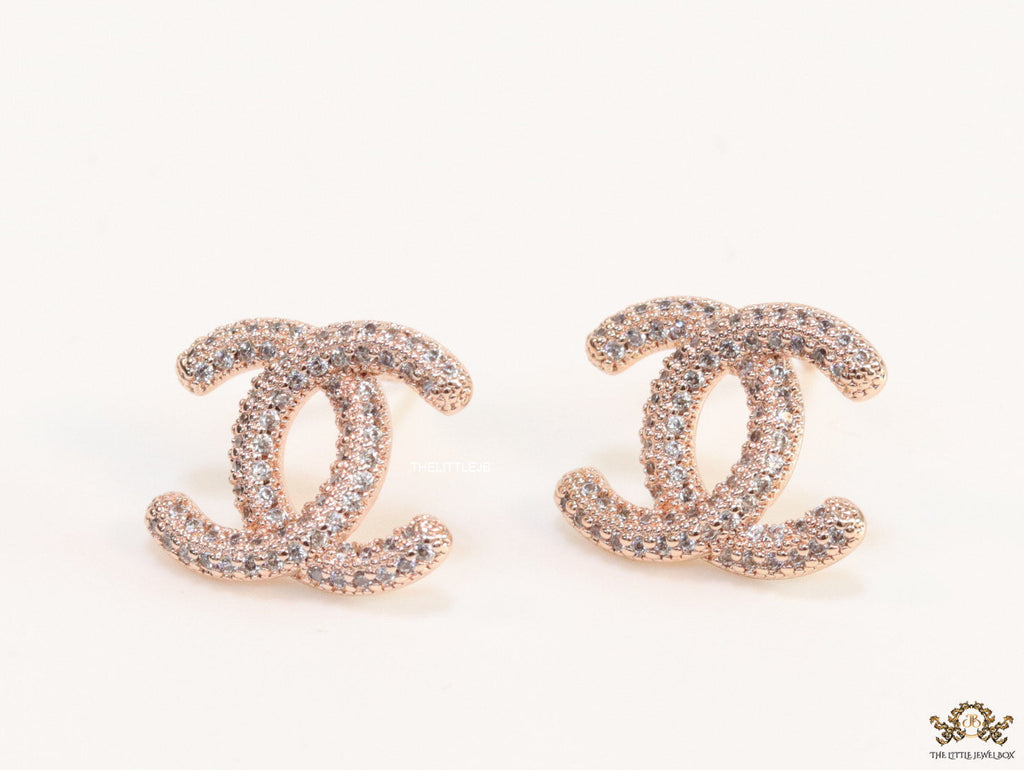 Rose gold plated twin C motif studs with cz