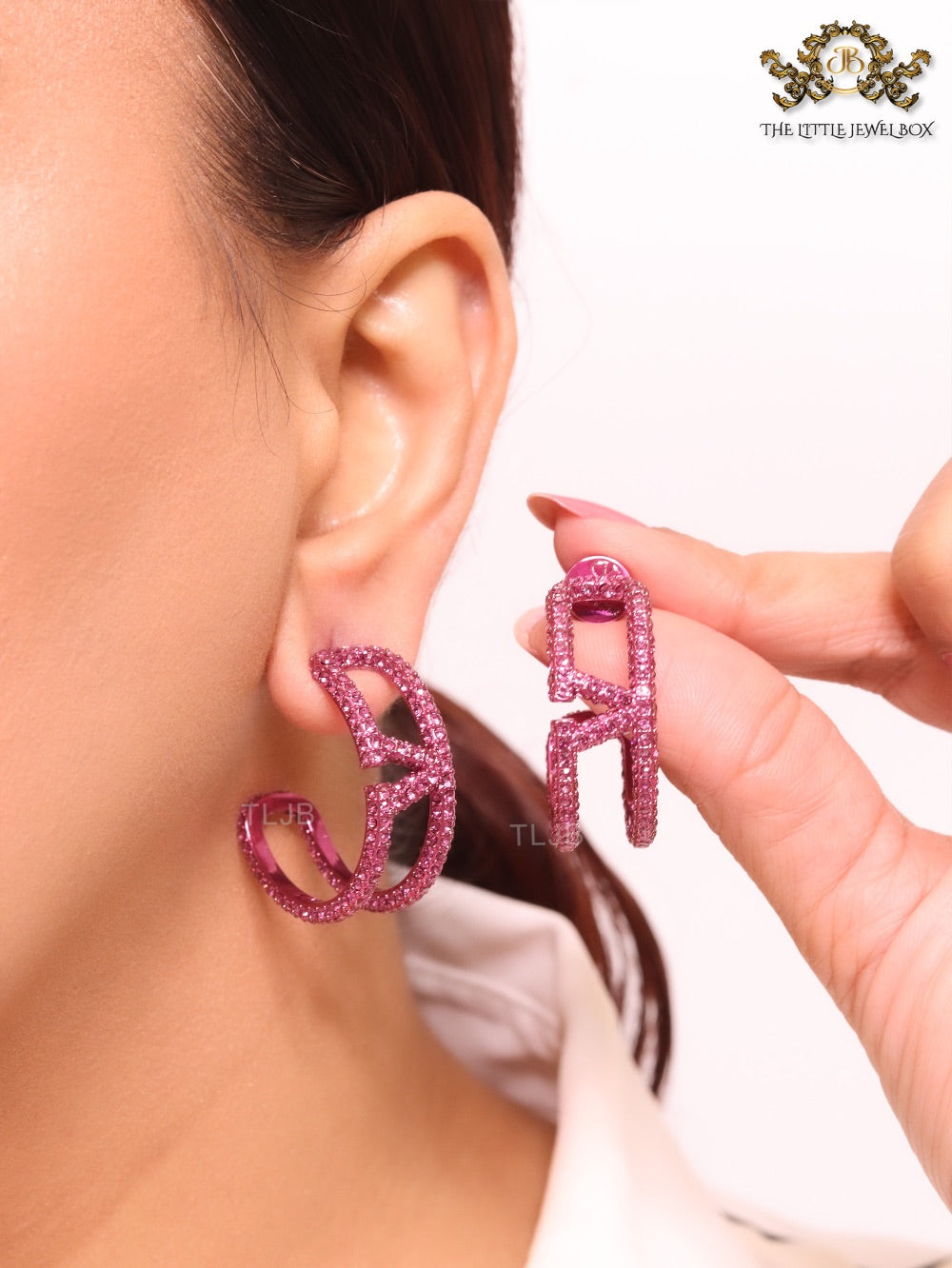 Pink curved open alphabet V hoops