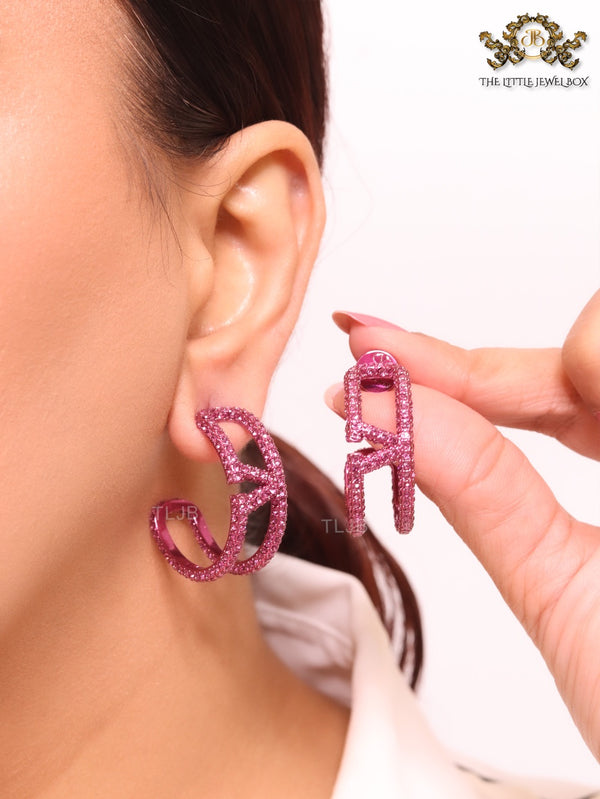Pink curved open alphabet V hoops