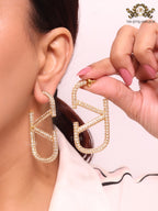 Open golden alphabet V earrings with cz 62 mm