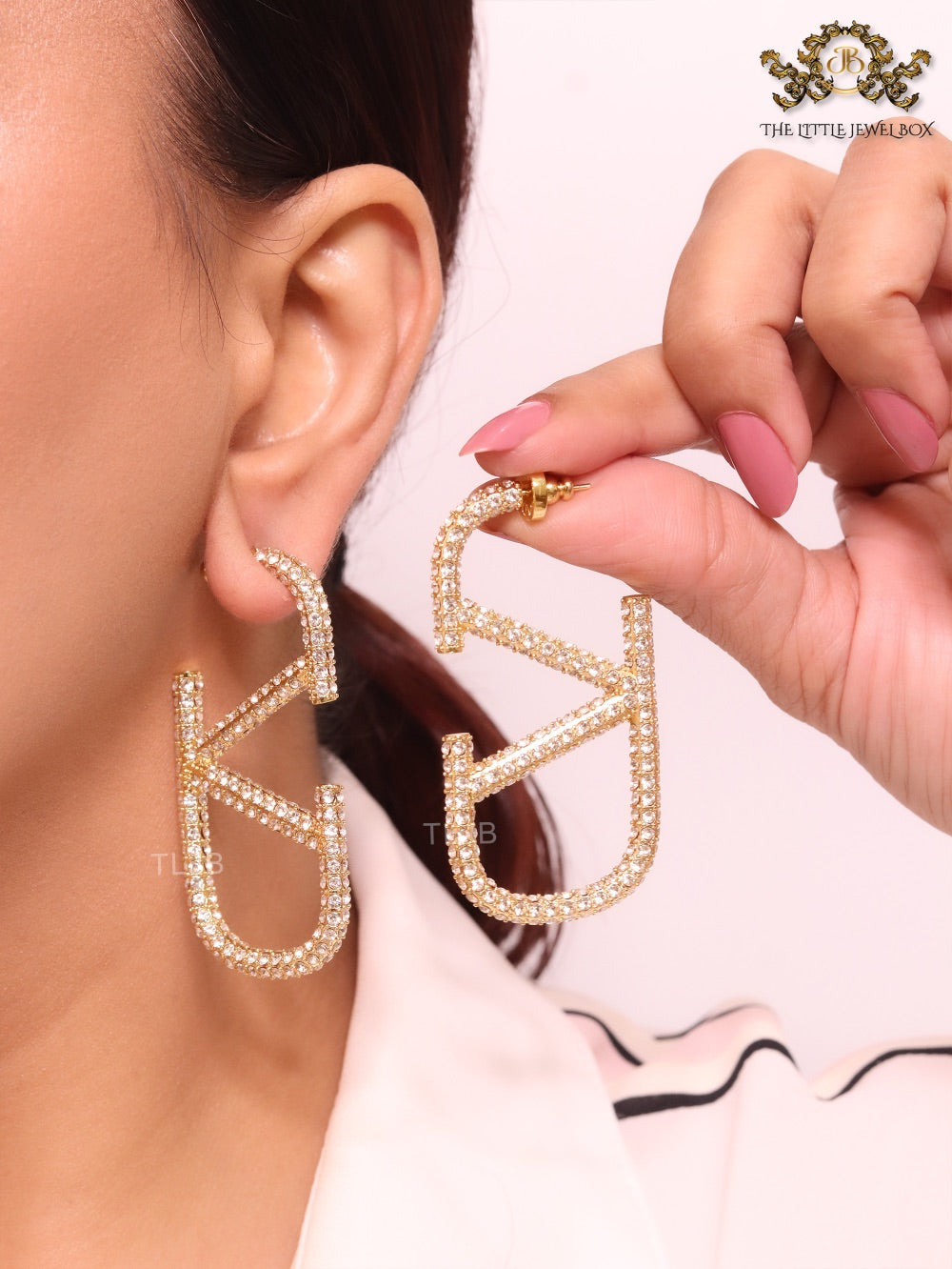Open golden alphabet V earrings with cz 62 mm