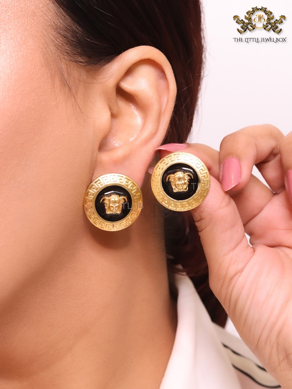 Gold round medusa motif black enamel earrings