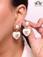 Double C on dangling heart and pearl earrings