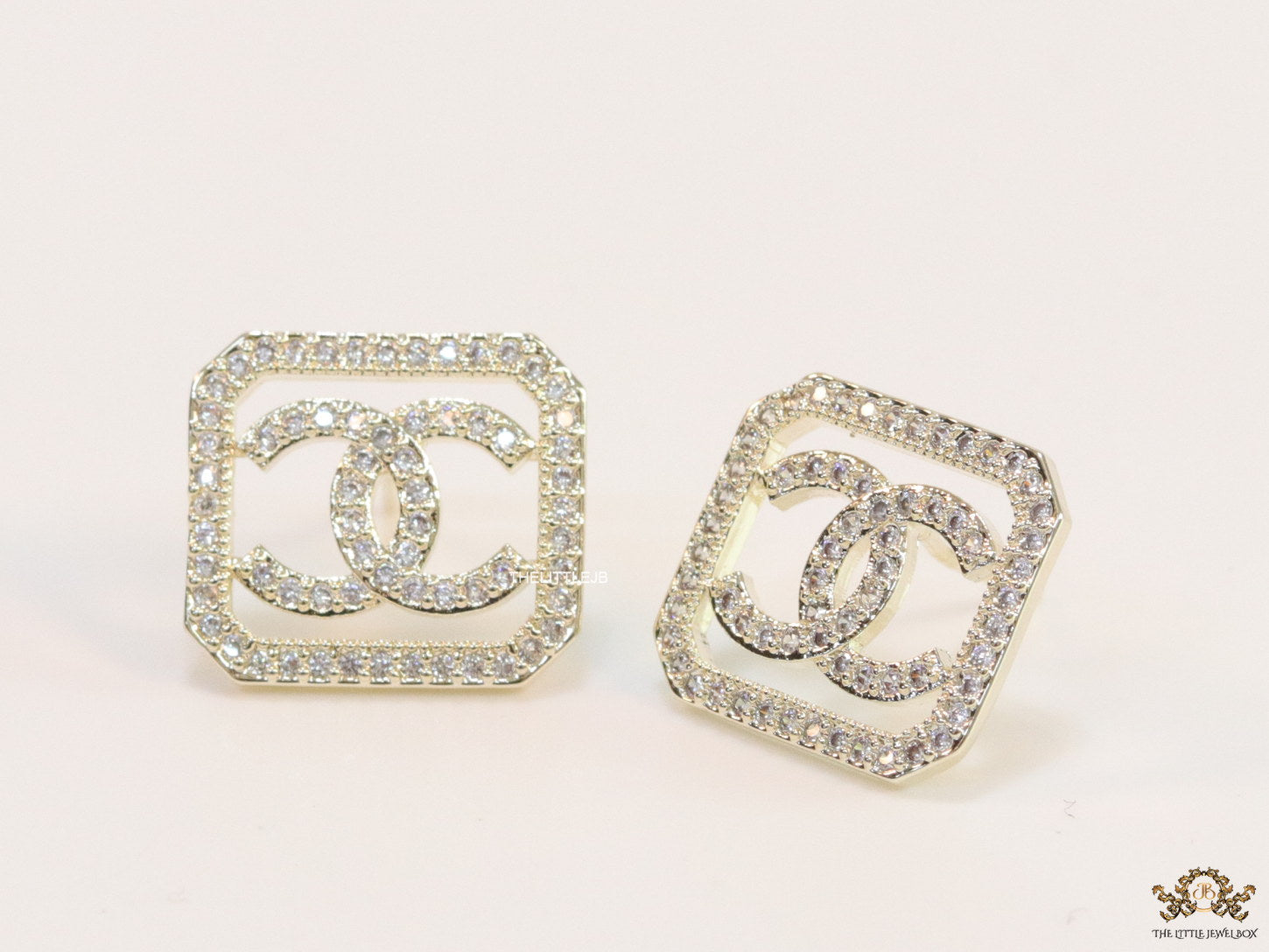 Gold plated square cz stud with twin C motif