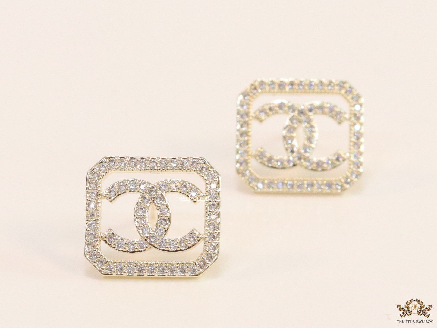 Gold plated square cz stud with twin C motif
