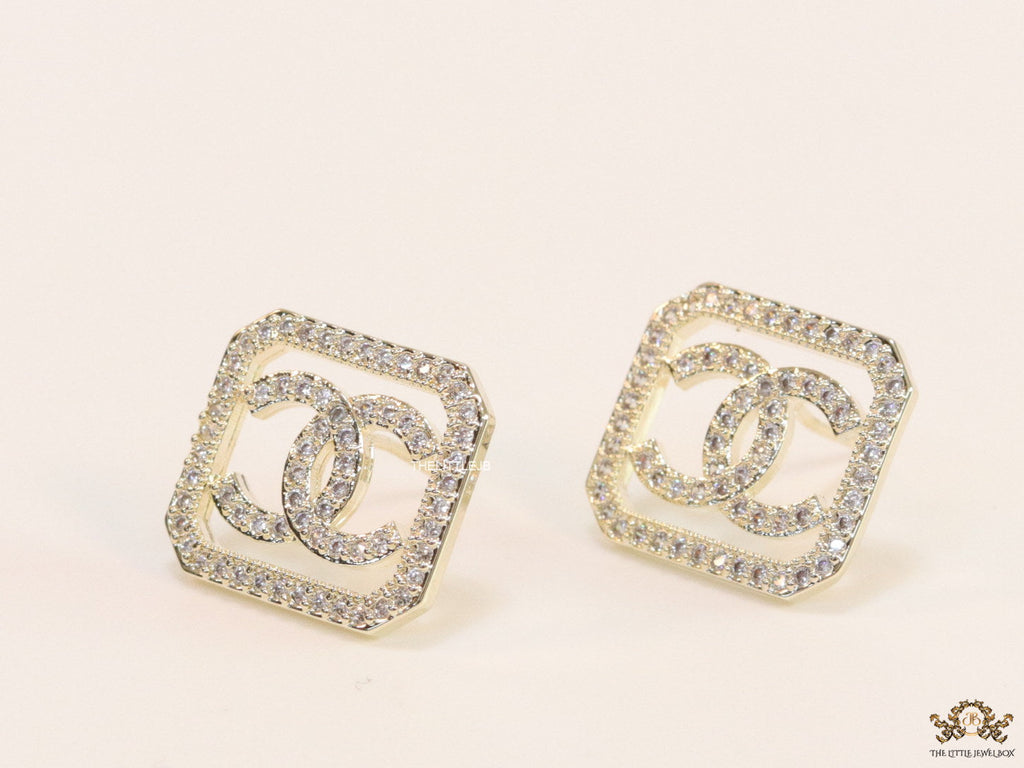 Gold plated square cz stud with twin C motif