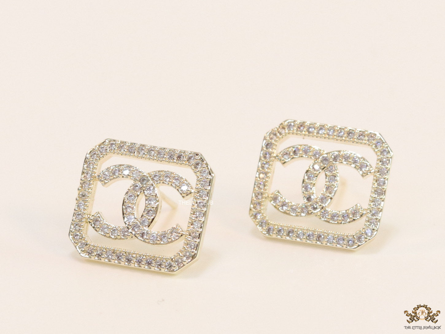 Gold plated square cz stud with twin C motif