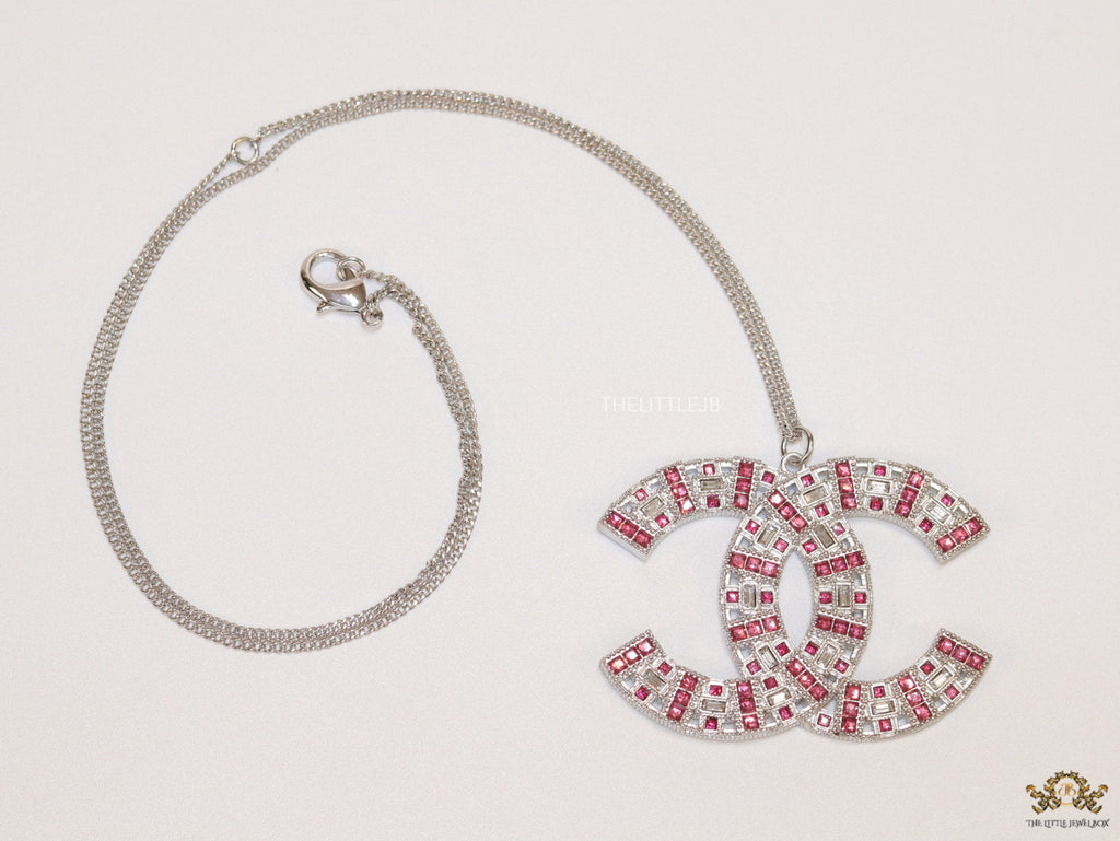 Platinum chain alphabet necklace with coloured cz