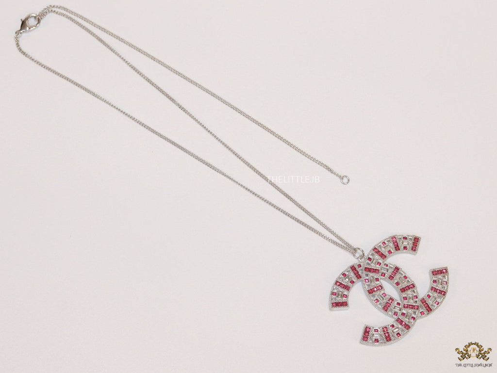 Platinum chain alphabet necklace with coloured cz