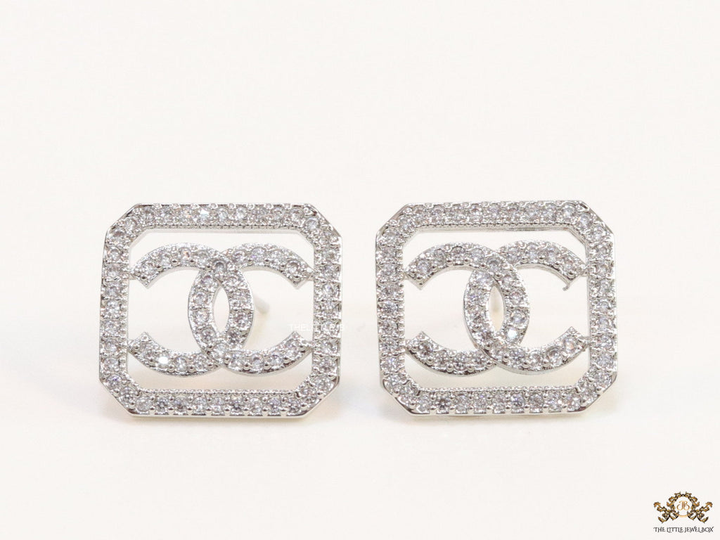 Platinum plated square cz stud with twin C motif