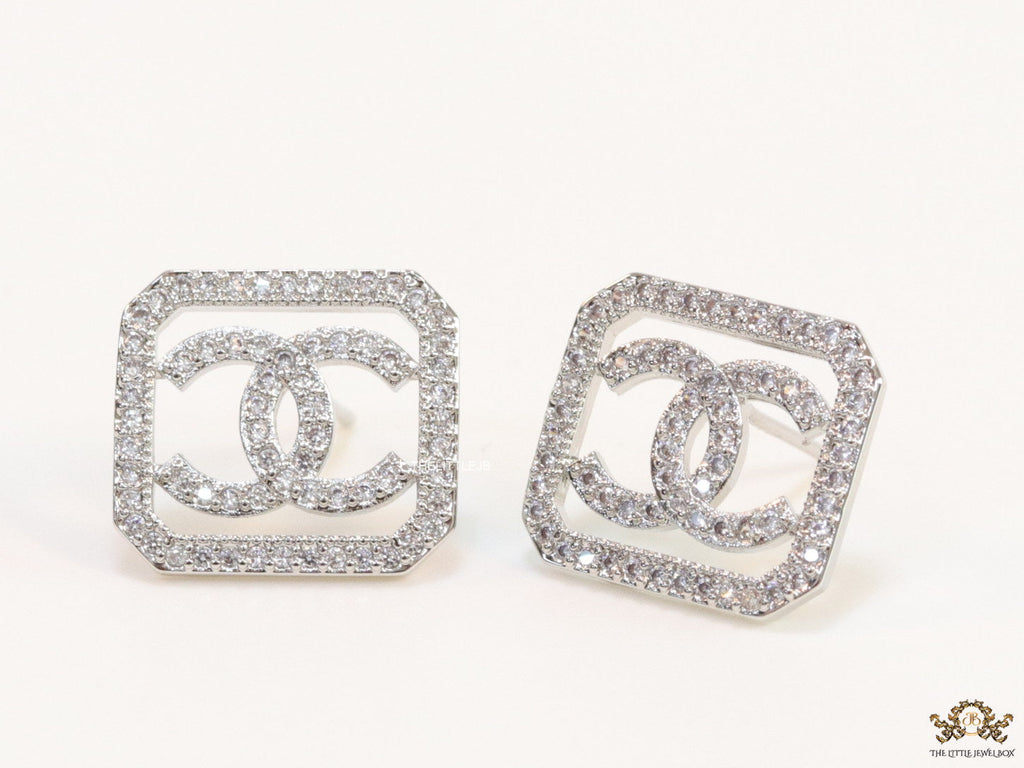 Platinum plated square cz stud with twin C motif