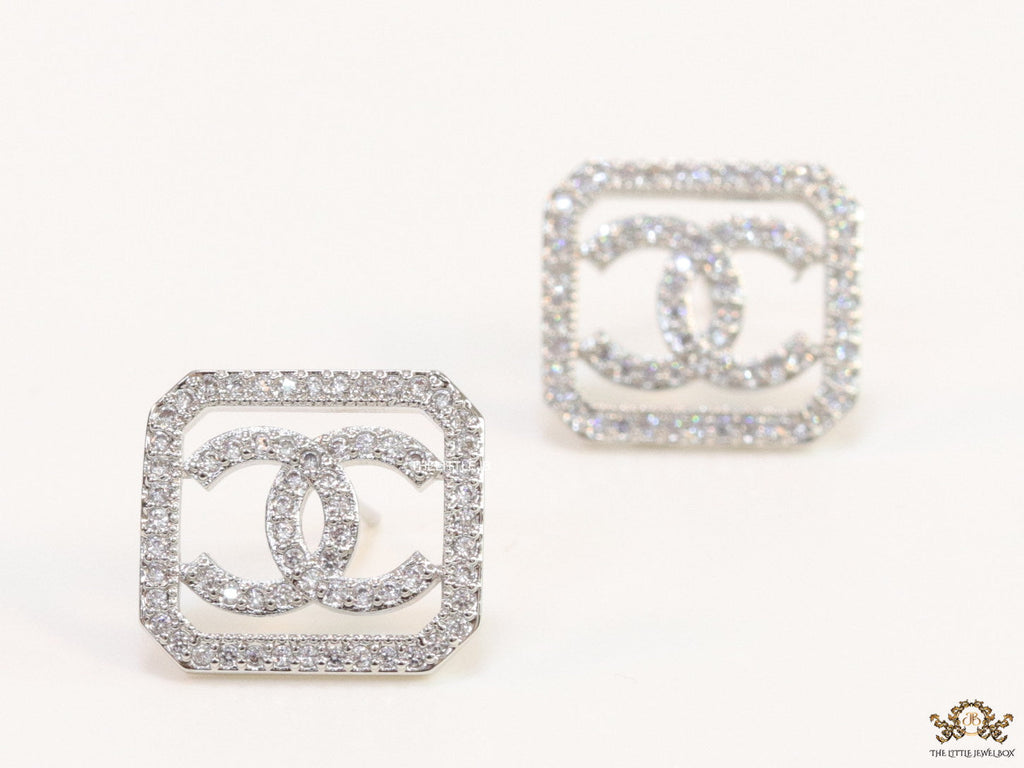 Platinum plated square cz stud with twin C motif