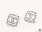 Platinum plated square cz stud with twin C motif