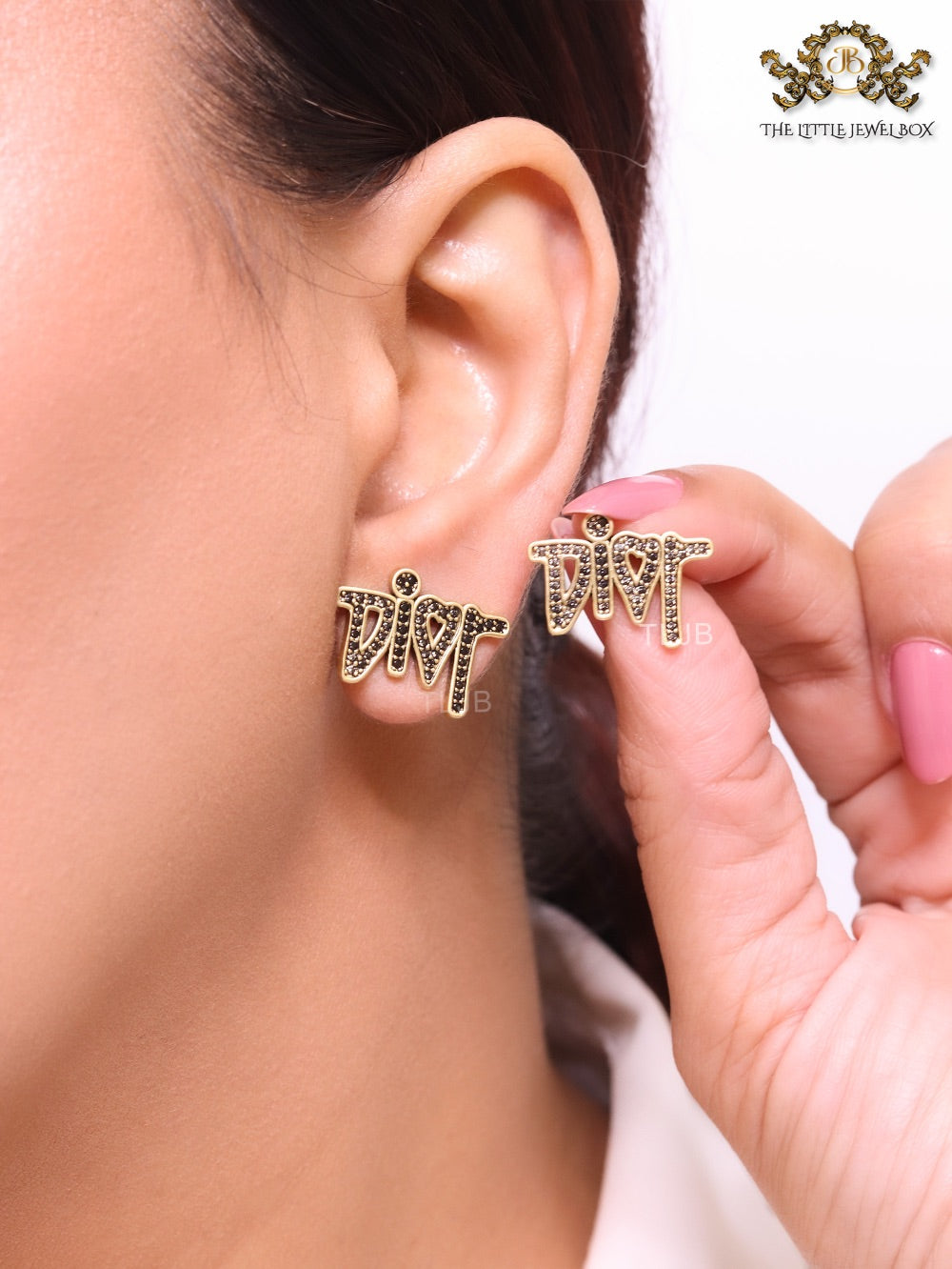 Gold Alphabet C and D earrings with black stones