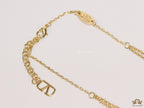 Dual chain golden necklace with alphabet pendant