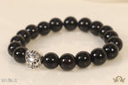 Glossy onyx beads bracelet with lion motif