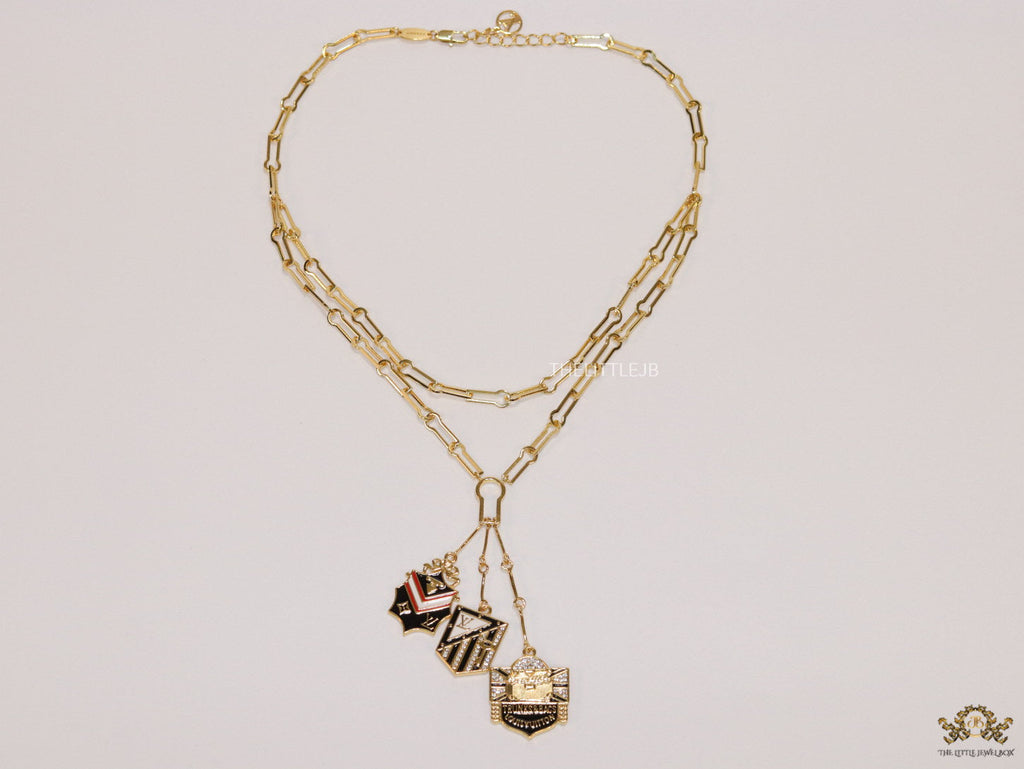 Dual link chain necklace with three in one pendant