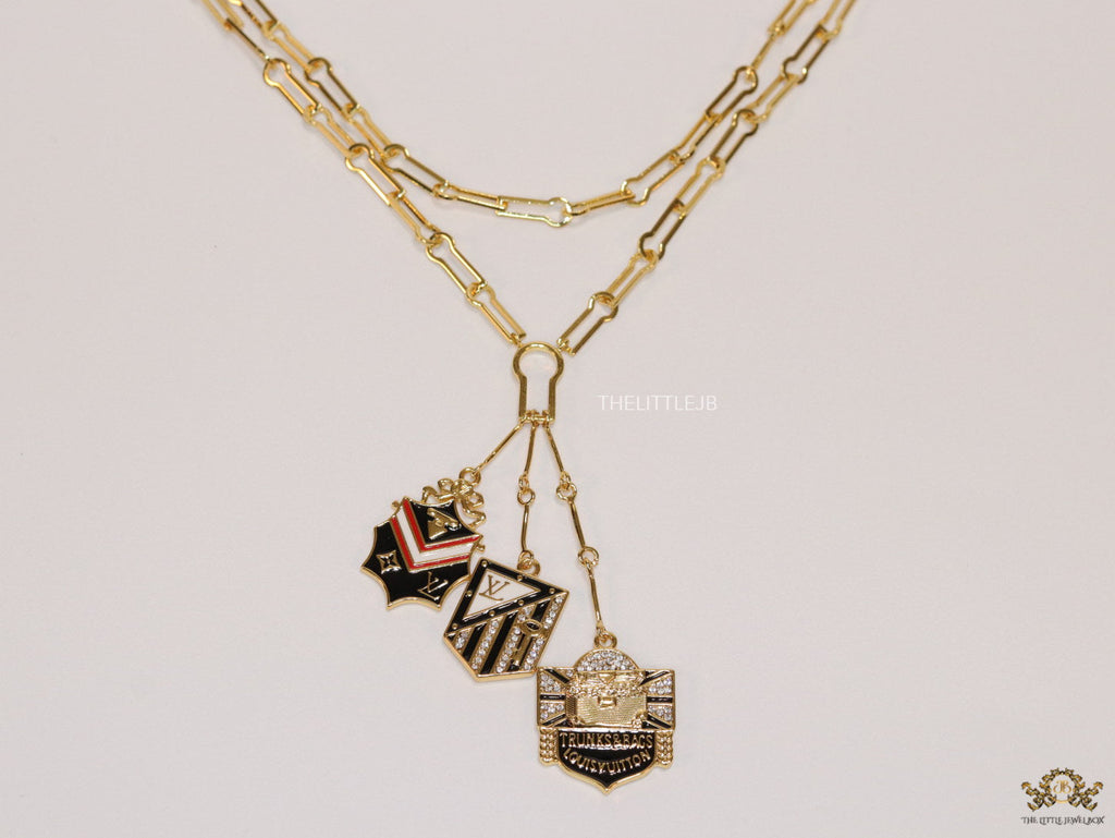 Dual link chain necklace with three in one pendant