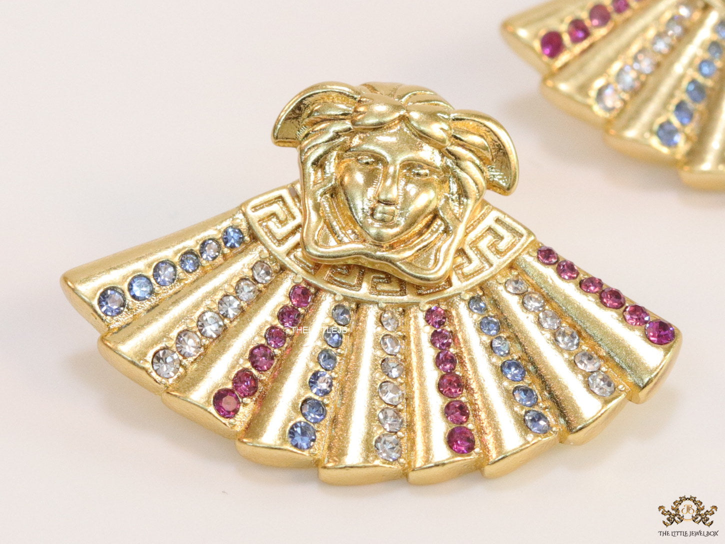 Detachable Medusa earrings with multi cz design at back