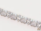 Fancy cut triangle and heart shape cz bracelet in platinum finish