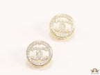 Round golden studs lined with cz and twin C motif centre