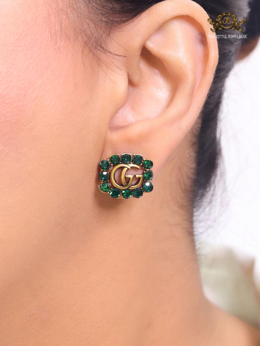 Double G emerald stones studs