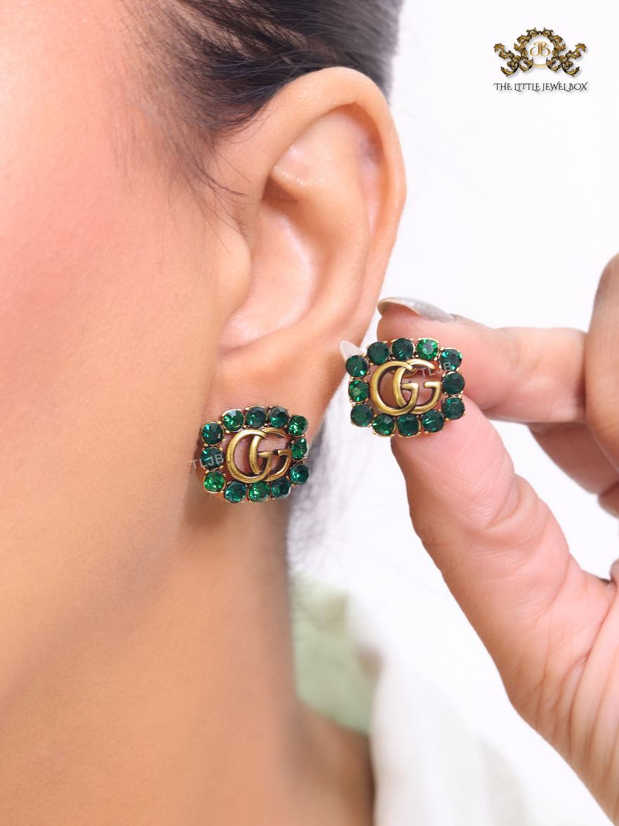 Double G emerald stones studs