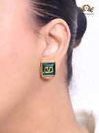 Alphabet V blue and gold studs