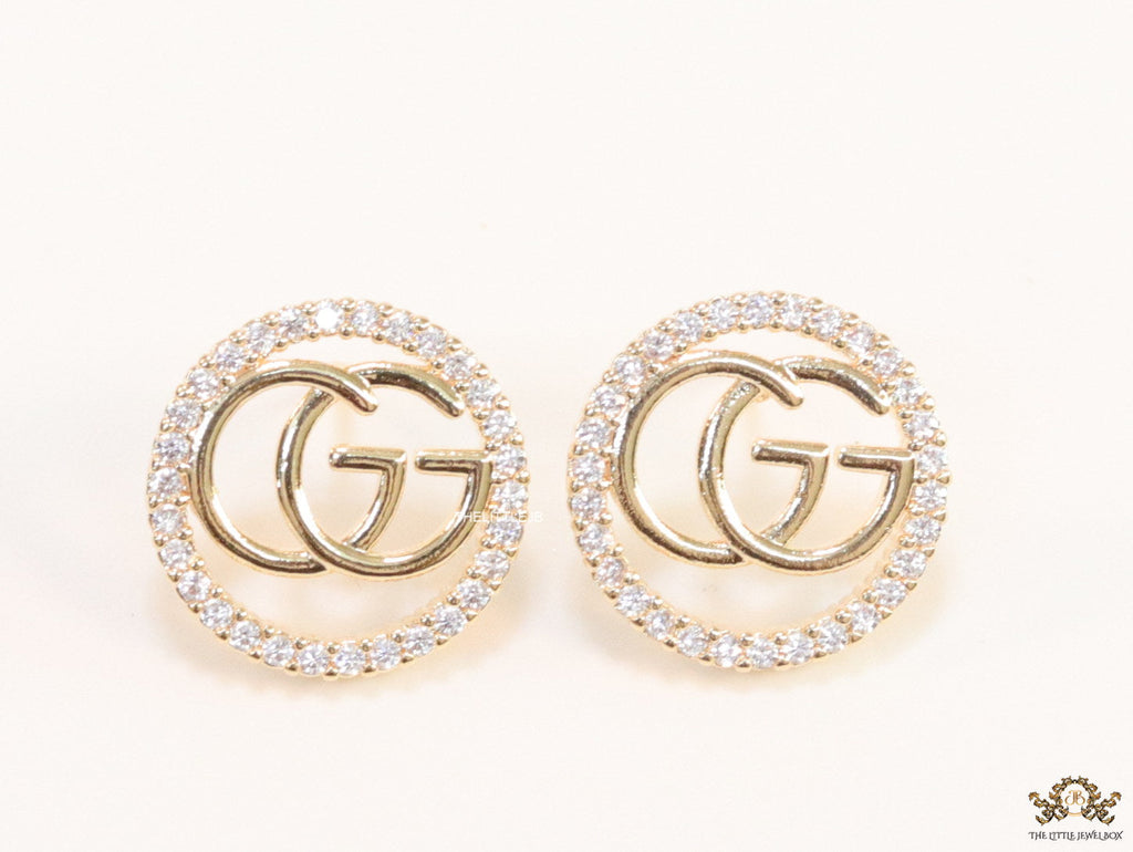 Gold plated round cz earrings with twin G motif