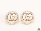 Gold plated round cz earrings with twin G motif