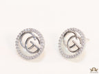 Platinum plated round cz earrings with twin G motif