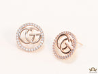 Rose gold plated round cz earrings with twin G motif