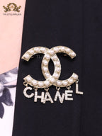 Platinum Double C pearl brooch with charms