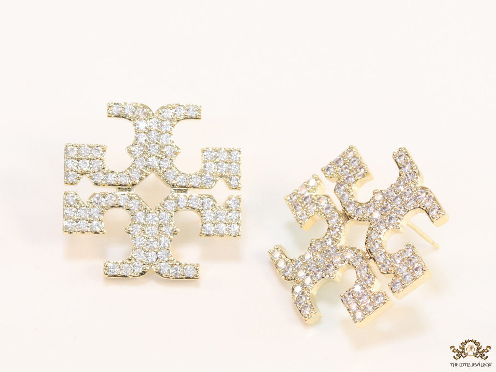 Gold plated twin T motif cz earrings