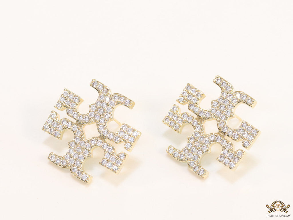 Gold plated twin T motif cz earrings