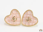 Light pink textured heart shaped studs with twin C motif in golden finish