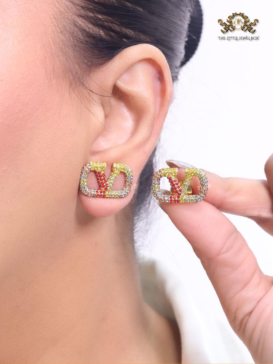 Alphabet V multi coloured studs